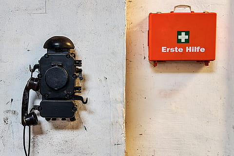 phone, first aid, first aid kit, help, kits medical, dressings, lost places, communication, technology, wall - building feature, text, sign, architecture, no people, built structure, western script, red, safety, connection, warning sign, old, day, accidents and disasters, close-up, photography themes, building exterior, push button, 5K, CC0, public domain, royalty free