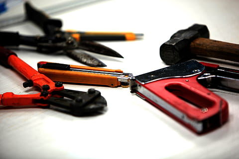 bolt cutter, staple gun, box cutter, white, surface, tools, hammer, puncher, scissors, stapler, pencil, office tools, equipment, close-up, indoors, still life, no people, black color, selective focus, table, metal, tool, choice, variation, work tool, hand tool, group of objects, screwdriver, red, studio shot, man made, high angle view, 1080P, CC0, public domain, royalty free
