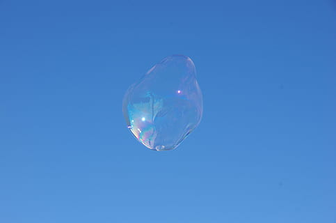 soap bubble, gigantic bubble, sky, blue, mid-air, clear sky, single object, no people, nature, copy space, fragility, soap sud, vulnerability, bubble, sphere, flying, day, transparent, colored background, close-up, studio shot, low angle view, blue background, purity, 4K, CC0, public domain, royalty free