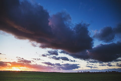 sunset, dusk, sky, clouds, field, grass, landscape, nature, outdoors, rural, cloud - sky, beauty in nature, scenics - nature, environment, dramatic sky, storm, cloudscape, tranquility, land, tranquil scene, no people, horizon, rural scene, thunderstorm, horizon over land, 5K, CC0, public domain, royalty free