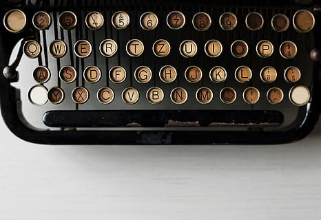 black typewriter, typewriter, electromechanical, machine, work, desk, electromechanical machine, office, still life, indoors, no people, close-up, technology, studio shot, communication, text, letter, alphabet, old, large group of objects, antique, high angle view, in a row, shape, capital letter, side by side, push button, keyboard, 5K, CC0, public domain, royalty free