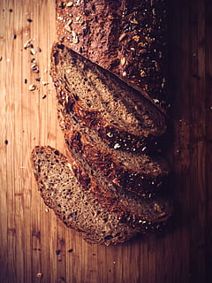 bread, grains, kitchen, baking, chef, food, food and drink, wood - material, freshness, directly above, no people, healthy eating, slice, close-up, wellbeing, brown, indoors, still life, table, brown bread, high angle view, ready-to-eat, healthy lifestyle, crunchy, rye - grain, breakfast, temptation, 4K, CC0, public domain, royalty free
