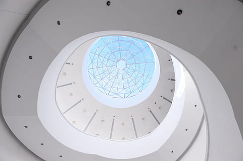 building, cbd, sky, architecture, indoors, built structure, geometric shape, modern, circle, no people, healthcare and medicine, shape, technology, ceiling, white color, sunlight, low angle view, business, directly below, design, window, corridor, brightly lit, bright, 2K, CC0, public domain, royalty free