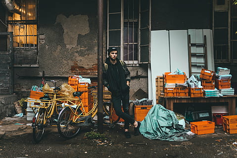 backdoor, break, man, person, resting, standing, waiting, one person, real people, casual clothing, full length, building exterior, young adult, lifestyles, architecture, front view, built structure, transportation, men, leisure activity, young men, mode of transportation, city, day, outdoors, 4K, CC0, public domain, royalty free