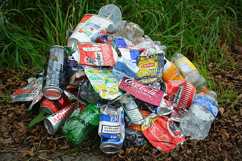 assorted-brand, labeled, lot, brown, soil, waste, garbage, cans, illegal dumping, high angle view, large group of objects, field, environmental issues, day, land, grass, plant, nature, no people, outdoors, text, environment, container, variation, plastic, dirt, pollution, abundance, 5K, CC0, public domain, royalty free