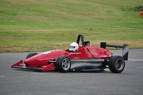 formula, one, argentina, transportation, sports race, mode of transportation, competition, sport, red, racecar, driving, speed, competitive sport, professional sport, auto racing, day, people, land vehicle, motorsport, car, motor vehicle, outdoors, side view, motor racing track, 4K, CC0, public domain, royalty free