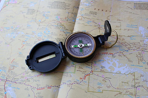 compass on map, compass, map, navigation, guidance, direction, world map, exploration, travel, navigational compass, no people, discovery, indoors, high angle view, still life, adventure, navigational equipment, journey, planning, text, table, close-up, road trip, searching, 5K, CC0, public domain, royalty free