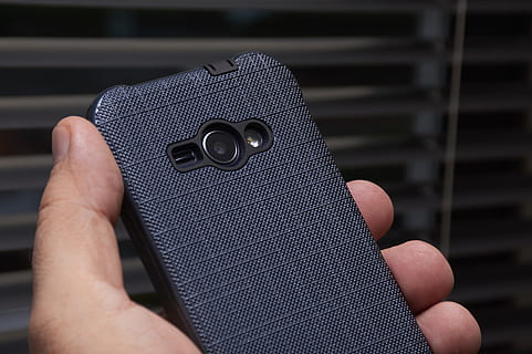 person, holding, blue, cased, smartphone, business, camera, case, cellular, cellular telephone, close-up, communication, design, device, equipment, hand, lens, mobile, mobile phone, modern, phone, technology, telephone, thumb through, window, wireless, human hand, human body part, one person, focus on foreground, finger, body part, human finger, indoors, men, single object, lifestyles, day, adult, real people, personal perspective, 5K, CC0, public domain, royalty free