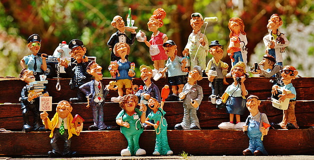 assorted figurines collection, figures, professions, work, funny, fun, career, job, real estate agents, businessman, plumber, painter, police, waitress, upper, veterinarian, vet, computer whiz, mechanic, nurse, office, art and craft, human representation, representation, statue, sculpture, group of people, figurine, creativity, male likeness, crowd, celebration, day, women, dancing, female likeness, religion, people, traditional clothing, outdoors, 5K, CC0, public domain, royalty free