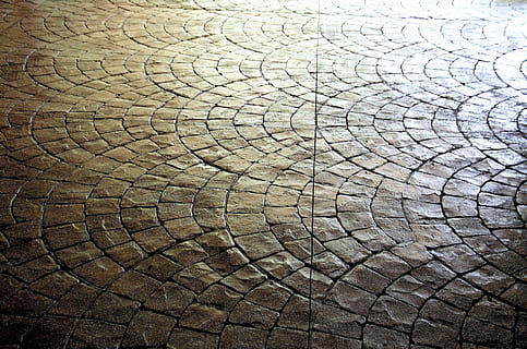 texture, default, background, geometry, stones, full frame, backgrounds, circle, textured, concentric, tree ring, no people, pattern, close-up, outdoors, design, geometric shape, shape, high angle view, day, cobblestone, sunlight, nature, repetition, abundance, art and craft, wheel, tire, 4K, CC0, public domain, royalty free