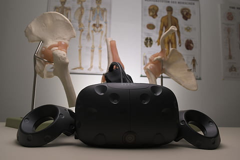 virtual, reality, meets, physical, therapy, black corded device, bones, skeleton, tech, poster, office, indoors, human representation, representation, reflection, adult, people, male likeness, human body part, table, males, men, toy, lifestyles, technology, creativity, headshot, female likeness, 5K, CC0, public domain, royalty free