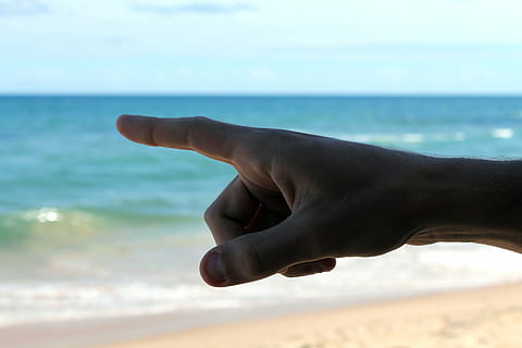 direction, hand, point, appointment, mar, finger, human hand, human body part, sea, water, beach, body part, human finger, land, one person, nature, sand, focus on foreground, gesturing, sky, close-up, day, human limb, 4K, CC0, public domain, royalty free
