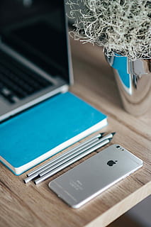 silver iphone, blue, notebook, pencils, Silver, iPhone, Apple, mobile, smartphone, notepad, laptop, computer, technology, equipment, business, internet, pC, wood - Material, table, desk, no People, indoors, wireless technology, high angle view, communication, close-up, connection, focus on foreground, selective focus, computer equipment, portable information device, home interior, still life, portability, day, keyboard, turquoise colored, electrical equipment, 4K
