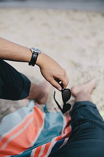 together, beach, sand, summer, man, blanket, holidays, vacations, male, sunglasess, men, outdoors, people, adult, males, sea, human Hand, caucasian Ethnicity, relaxation, lifestyles, human body part, one man only, one person, holding, rock climbing, hand, real people, day, leisure activity, land, focus on foreground, sport, time, nature, body part, watch, finger, 4K