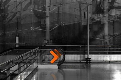 escalator, bracket, orange, equation, symbol, math, icon, greather than, architecture, built structure, building exterior, reflection, glass - material, no people, building, transportation, orange color, day, safety, city, outdoors, travel, transparent, protection, communication, isolated color, mode of transportation, 4K, CC0, public domain, royalty free