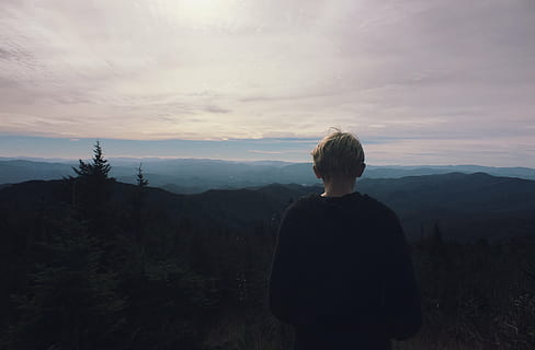 boy, standing, cliff, black, crew, neck, sweater, facing, mountain, cloudy, sky, dark, clouds, nature, trees, plants, forest, people, travel, guy, outdoor, adventure, view, sunset, solitude, one person, rear view, landscape, real people, outdoors, cloud - sky, beauty in nature, leisure activity, lifestyles, scenics - nature, tranquility, tranquil scene, non-urban scene, men, environment, idyllic, looking at view, 4K, CC0, public domain, royalty free