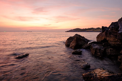 hav, scape, solnedgang, scenics, natur, sky - himmel, himmel, vann, stein, naturskjønnhet - natur, fast, rock-objekt, horisont over vann, horisont, skjønnhet i naturen, rolig scene, ro, Strand, land, oransje farge, bevegelse, ingen folk, utendørs, 4K, CC0, offentlig domene, opphavsrett gratis