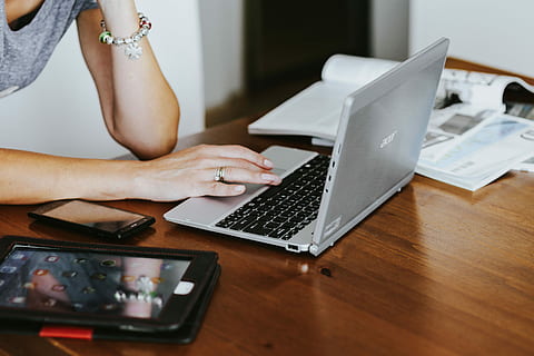 silver laptop, various, items, table, Silver, laptop, magazines, computer, technology, notebook, camera, smartphone, women, working, people, internet, indoors, one Person, typing, adult, wireless Technology, females, home Interior, business, human Hand, caucasian Ethnicity, using Laptop, desk, connection, communication, real people, lifestyles, sitting, midsection, human body part, hand, surfing the net, 5K