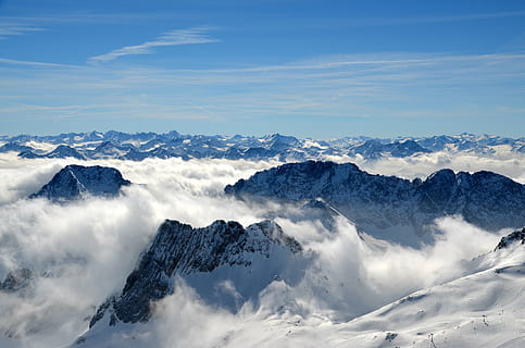 aerial, photography, mountain, covered, snow, blue, sky, summit, clouds, mountains, alpine, landscape, nature, horizon, great, rock, cloud - sky, beauty in nature, scenics - nature, cold temperature, environment, winter, mountain range, tranquil scene, white color, tranquility, no people, fog, snowcapped mountain, mountain peak, outdoors, 4K, CC0, public domain, royalty free