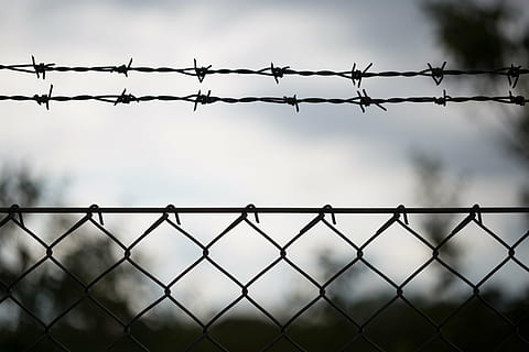 graysacle photo, barbed, wire, barbwire, protected, no entry, danger, trespassing, border, fence, metal, protection, security, boundary, forbidden, protect, safety, secure, guard, steel, barb, dangerous, defense, private, prohibit, barbed Wire, prison, chainlink Fence, barrier, day, no people, wire mesh, focus on foreground, sky, nature, cloud - sky, outdoors, backgrounds, architecture, exclusion, 5K