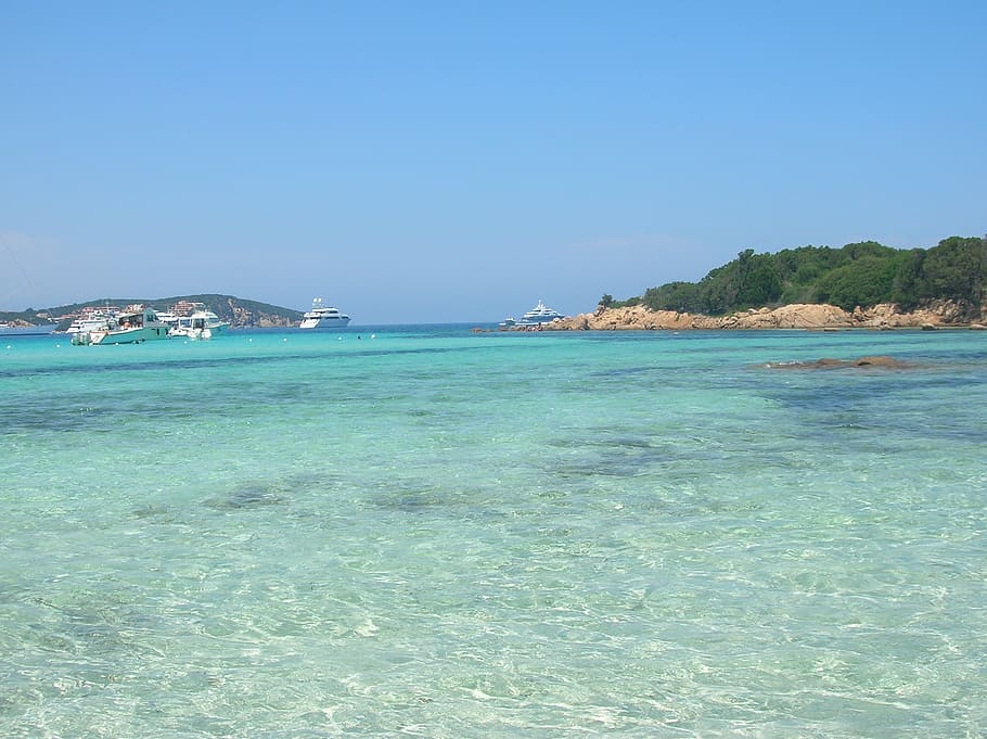 propagació, sardenya, platja, mar, estiu, illa, vacances, naturalesa, blau, sorra, idíl·lic, clima tropical, relaxació, complex turístic, viatjar, línia de costa, aigua, bellesa a la natura, escenics - natura, cel, cel clar, escena tranquil·la, tranquil·litat, dia, terra, davant del mar, còpia espai, color turquesa, cap gent, escena no urbana, a l'aire lliure, poc profund, llacuna, 1080P