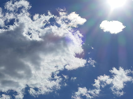clouds, sky, sun, rays, blue, white clouds, summer day, clouds form, cloud - sky, beauty in nature, sunlight, low angle view, nature, sunbeam, tranquility, scenics - nature, no people, day, tranquil scene, outdoors, white color, bright, lens flare, cloudscape, idyllic, brightly lit, meteorology, solar flare, 4K, CC0, public domain, royalty free