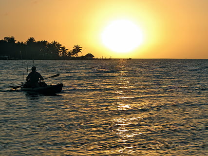 sunset, ocean, florida, kayak, water, nautical vessel, sky, waterfront, transportation, sea, mode of transportation, beauty in nature, real people, scenics - nature, orange color, silhouette, sun, nature, men, horizon, sunlight, horizon over water, outdoors, rowing, 4K, CC0, public domain, royalty free