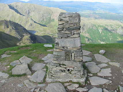 trig, point, triangulation, pillar, ordnance, survey, mountain, nature, rock - Object, outdoors, stone Material, scenics - nature, solid, tranquil scene, landscape, beauty in nature, tranquility, rock, day, non-urban scene, environment, no people, mountain range, rock formation, travel destinations, architecture, plant, history, stone wall, ancient civilization, formation, 2K, CC0, public domain, royalty free