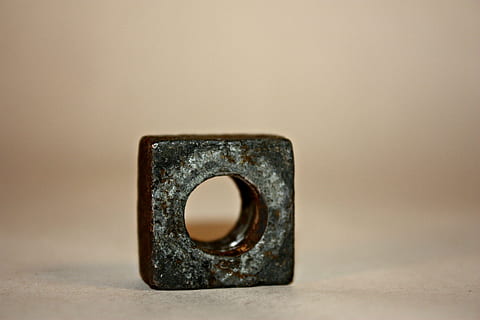 brass square ring, circle, rust, square, square nut, single object, indoors, no people, studio shot, close-up, metal, copy space, alloy, steel, hole, simplicity, colored background, connection, focus on foreground, nature, gray, strength, still life, 2K, CC0, public domain, royalty free