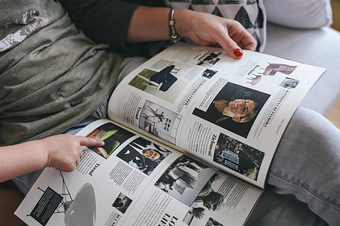 designer magazine, couch, Woman reading, designer, magazine, woman, reading, style, design, business, men, adult, people, women, finance, human hand, adults only, human body part, indoors, hand, table, high angle view, real people, midsection, communication, computer, holding, technology, two people, connection, 5K