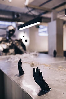 metal figures, table, full, metal shavings, Metal, figures, art, exhibition, installation, exposition, expo, shavings, hard, sculpture, indoors, people, no people, day, focus on foreground, shoe, flooring, architecture, black color, still life, arts culture and entertainment, illuminated, representation, pair, close-up, built structure, low section, 5K, CC0, public domain, royalty free