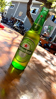 sol, beer, burger, green color, bottle, no people, food and drink, container, close-up, focus on foreground, table, alcohol, refreshment, drink, wood - material, tilt, day, text, shadow, sunlight, high angle view, number, outdoors, 4K, CC0, public domain, royalty free