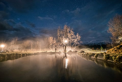 tree, light, beside, body, water, dark, blue, clouds, sky, night, reflection, trees, view, nature, lake, forest, landscape, river, outdoors, scenics, scenics - nature, beauty in nature, tranquility, cloud - sky, tranquil scene, environment, star - space, no people, plant, land, astronomy, reflection lake, 2K
