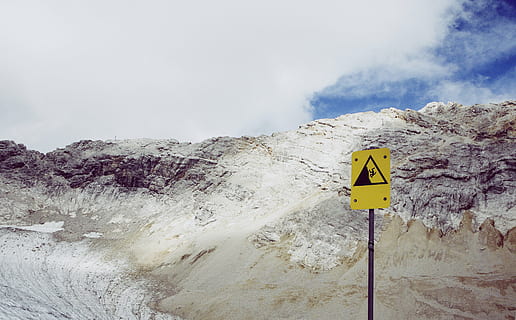 yellow road signage, fault, block, mountain, road, signage, daytime, nature, summit, peaks, sign, sky, clouds, white, blue, communication, warning sign, guidance, day, outdoors, no people, yellow, water, information, cloud - sky, information sign, road sign, scenics - nature, arrow symbol, environment, 4K