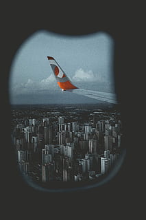orange, gray, plane, winged, flying, air, daytime, view, plane wing, window, wing, building, skyscraper, cityscape, clouds, flight, aeroplane, airplane, travel, transport, looking out, high up, horizon, city, penumbra, airplane window, air plane, city view, aerial view, sky, building exterior, architecture, built structure, cloud - sky, nature, air vehicle, office building exterior, no people, transportation, landscape, transparent, outdoors, 5K, CC0, public domain, royalty free