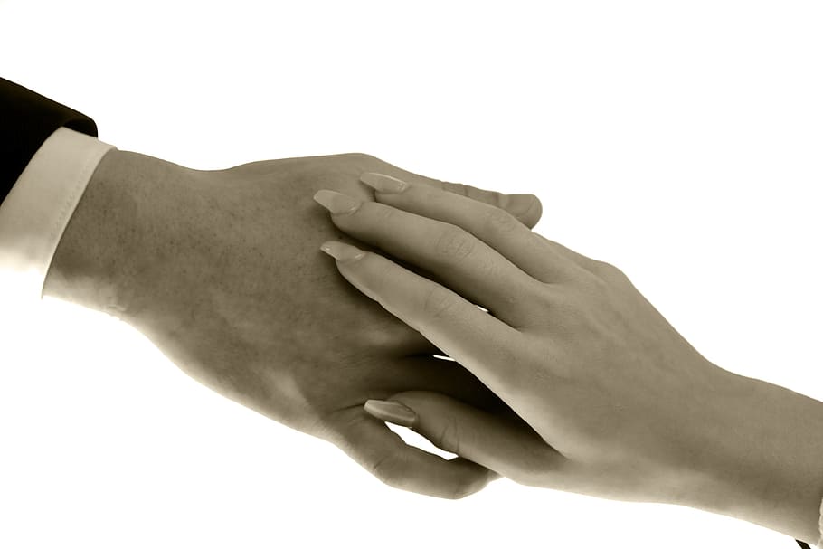 dona, home, celebració, mans, contacte, afecte, amor, amistat, comoditat, compassió, dol, soci, dit, ungles, mà humana, mà, part del cos humà, dues persones, dones, homes, unió, adult, gent, emoció positiva, dit humà, part del cos, tir de l'estudi, fons blanc, emoció, femelles, parella - relació, cura, 5K