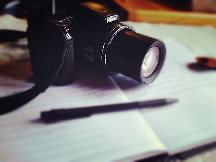 selective, focus, black, nikon bridge camera, printed, notebook, camera, pen, diary, still life, indoors, black color, no people, technology, table, music, close-up, arts culture and entertainment, selective focus, listening, headphones, equipment, communication, focus on foreground, writing instrument, audio equipment, high angle view, electrical equipment, 2K, CC0, public domain, royalty free