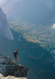 man, standing, grey, rock, cliff, overview, forest, daytime, mountain cliff, mountain, outdoors, nature, hiking, people, men, one Person, mountain Peak, rock - Object, adventure, adult, scenics, landscape, adults only, scenics - nature, beauty in nature, real people, tranquil scene, non-urban scene, lifestyles, day, environment, leisure activity, tranquility, water, mountain range, full length, idyllic, 5K, CC0, public domain, royalty free