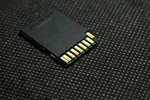 black sd card, sd, card, data, storage, technology, flash, digital, drive, plastic, electronic, external, accessory, equipment, backgrounds, computer, close-up, indoors, no people, metal, black color, connection, high angle view, silver colored, pattern, single object, still life, studio shot, communication, selective focus, computer equipment, textured, electrical component, electrical equipment, leather, cpu, 5K, CC0, public domain, royalty free