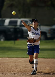 softball, player, throwing, ball, game, competition, female, teen, play, sport, uniform, field, athlete, teenager, concentration, ballgame, hand, glove, aim, infield, full length, one person, playing, child, young adult, standing, mid-air, day, motion, real people, baseball - sport, front view, hitting, sports uniform, lifestyles, skill, outdoors, 1080P, CC0, public domain, royalty free
