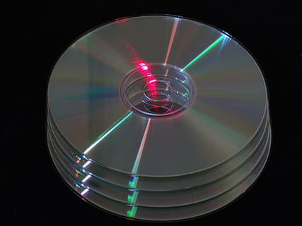 cd, dvd, disk, floppy disk, computer, studio shot, technology, no people, black background, geometric shape, circle, indoors, science, multi colored, shape, close-up, light - natural phenomenon, light beam, illuminated, data, glass - material, lighting equipment, reflection, connection, digital composite, projection, 5K, CC0, public domain, royalty free