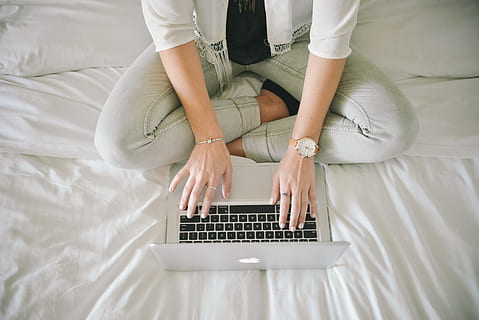 legs, notebook, working, wristwatch, cross-legged, internet, macbook, sitting, typing, write, writer, writing, wireless technology, computer, laptop, technology, furniture, communication, using laptop, one person, connection, bed, indoors, adult, domestic room, high angle view, human body part, bedroom, human hand, computer network, hand, keyboard, human limb, 5K, CC0, public domain, royalty free