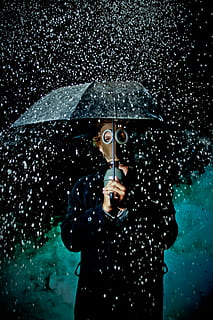 man, wearing, brown, mask, holding, umbrella, picture, person, gas, dark, people, raining, bottle, bokeh, rain, weather, wet, one man only, protection, one person, mid adult, front view, adult, standing, water, real people, security, lifestyles, waist up, three quarter length, drop, clothing, young adult, rainy season, obscured face, black background, raindrop, 2K, CC0, public domain, royalty free