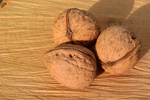 nuts, walnuts, shell, walnut, food and drink, food, wellbeing, healthy eating, wood - material, still life, freshness, table, indoors, close-up, no people, focus on foreground, group of objects, brown, nut - food, high angle view, nut, vegetable, fruit, wood grain, 4K, CC0, public domain, royalty free