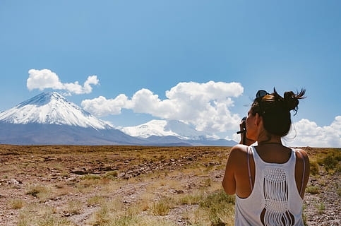 adventure, clouds, cloudy, daylight, foggy, girl, grass, hazy, landscape, misty, mountain, murky, outdoors, person, photograph, sky, soil, travel, volcano, one person, rear view, scenics - nature, beauty in nature, women, leisure activity, adult, cloud - sky, young adult, standing, nature, non-urban scene, lifestyles, land, day, mountain range, hairstyle, mountain peak, 4K, CC0, public domain, royalty free