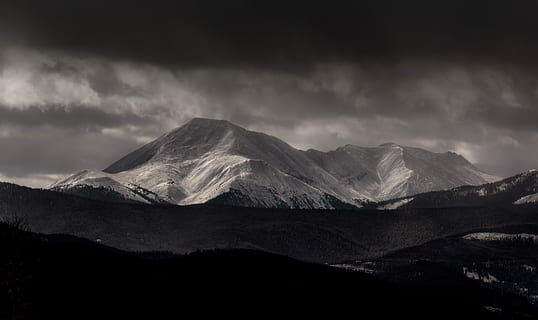 grayscale photography, mountain, cloudy, sky, photography of mountain, mountain range, snow, cloud, black and white, mountain top, natural elevation, light, dramatic, black, white, fall, nature, landscape, scenics - nature, cloud - sky, beauty in nature, environment, no people, storm, mountain peak, tranquil scene, tranquility, non-urban scene, snowcapped mountain, land, winter, outdoors, dark, power in nature, 4K, CC0, public domain, royalty free