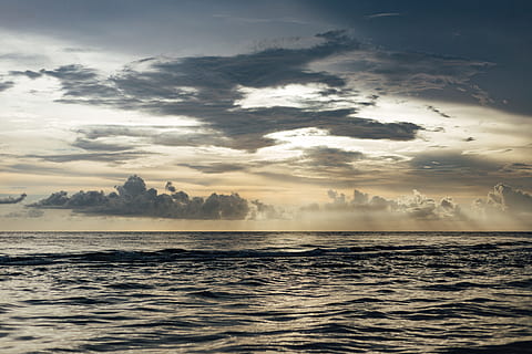 sea, dawn, landscape, nature, beach, clouds, dark, dramatic, dusk, evening, light beam, ocean, outdoors, reflection, seascape, sky, storm, sunset, travel, water, waves, cloud - sky, scenics - nature, beauty in nature, tranquility, tranquil scene, waterfront, no people, horizon over water, horizon, idyllic, sunlight, architecture, 5K, CC0, public domain, royalty free