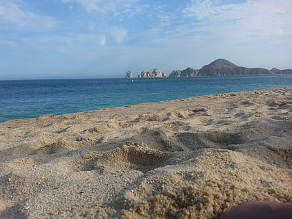 sand, cabo, arch, mexico, beach, view, sea, water, sky, land, rock, scenics - nature, beauty in nature, horizon over water, rock - object, tranquil scene, horizon, nature, solid, tranquility, cloud - sky, day, no people, rock formation, 2K, CC0, public domain, royalty free
