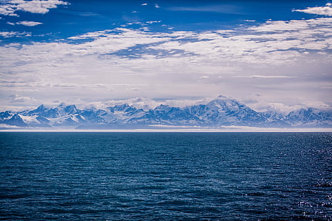 clouds, cloudy, cold, landscape, mountain range, mountains, nature, ocean, peaks, sea, sky, snow, water, winter, blue, beauty in nature, scenics, tranquil scene, tranquility, horizon over water, no people, outdoors, scenics - nature, mountain, cold temperature, cloud - sky, snowcapped mountain, non-urban scene, environment, ice, lagoon, 5K, CC0, public domain, royalty free