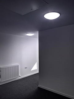 two, white, ceiling lights, concrete, wall, ceilings, interior, design, architecture, light, angle, black and white, indoors, empty, lighting equipment, home improvement, illuminated, home interior, no people, domestic room, built structure, wall - building feature, ceiling, electric light, white color, recessed light, light - natural phenomenon, flooring, building, office, light fixture, blank, 1080P, CC0, public domain, royalty free
